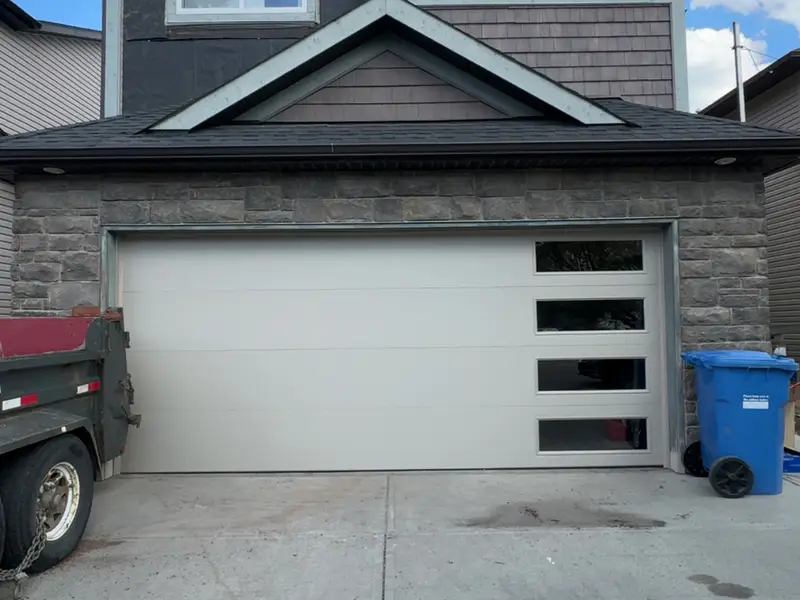 Modern Calgary home exterior with professional garage door installation